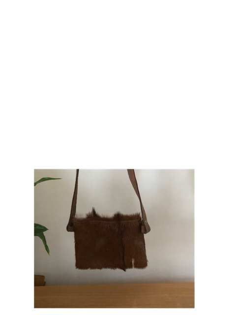 Genuine goat hide phone cross body bag with lovely marking