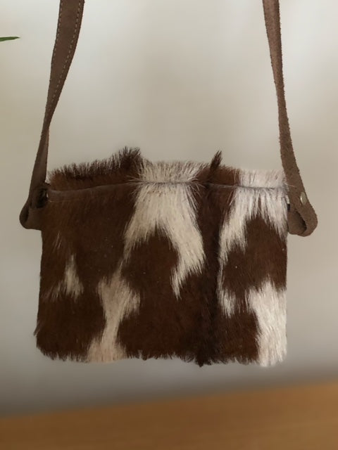 Genuine goat hide phone cross body bag with lovely marking