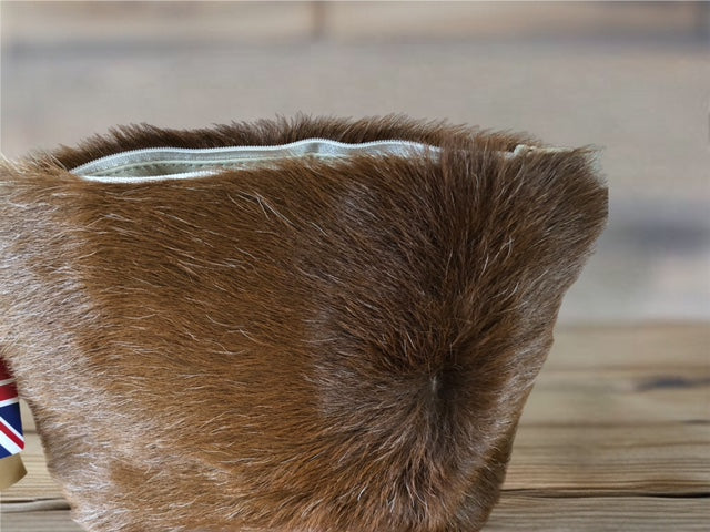Genuine goat hide lined clutch bag with wrist strap and zip