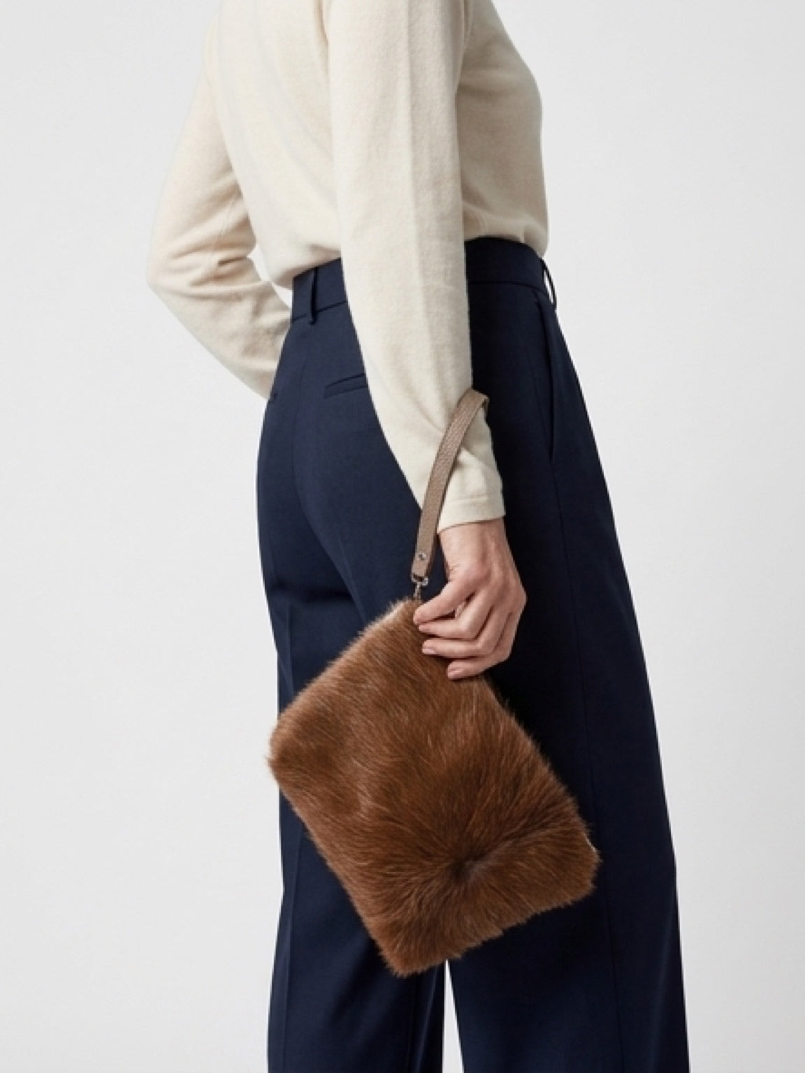 Genuine goat hide lined clutch bag with wrist strap and zip